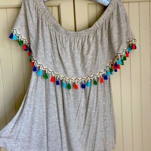 On or off shoulder fun tassel embellished top